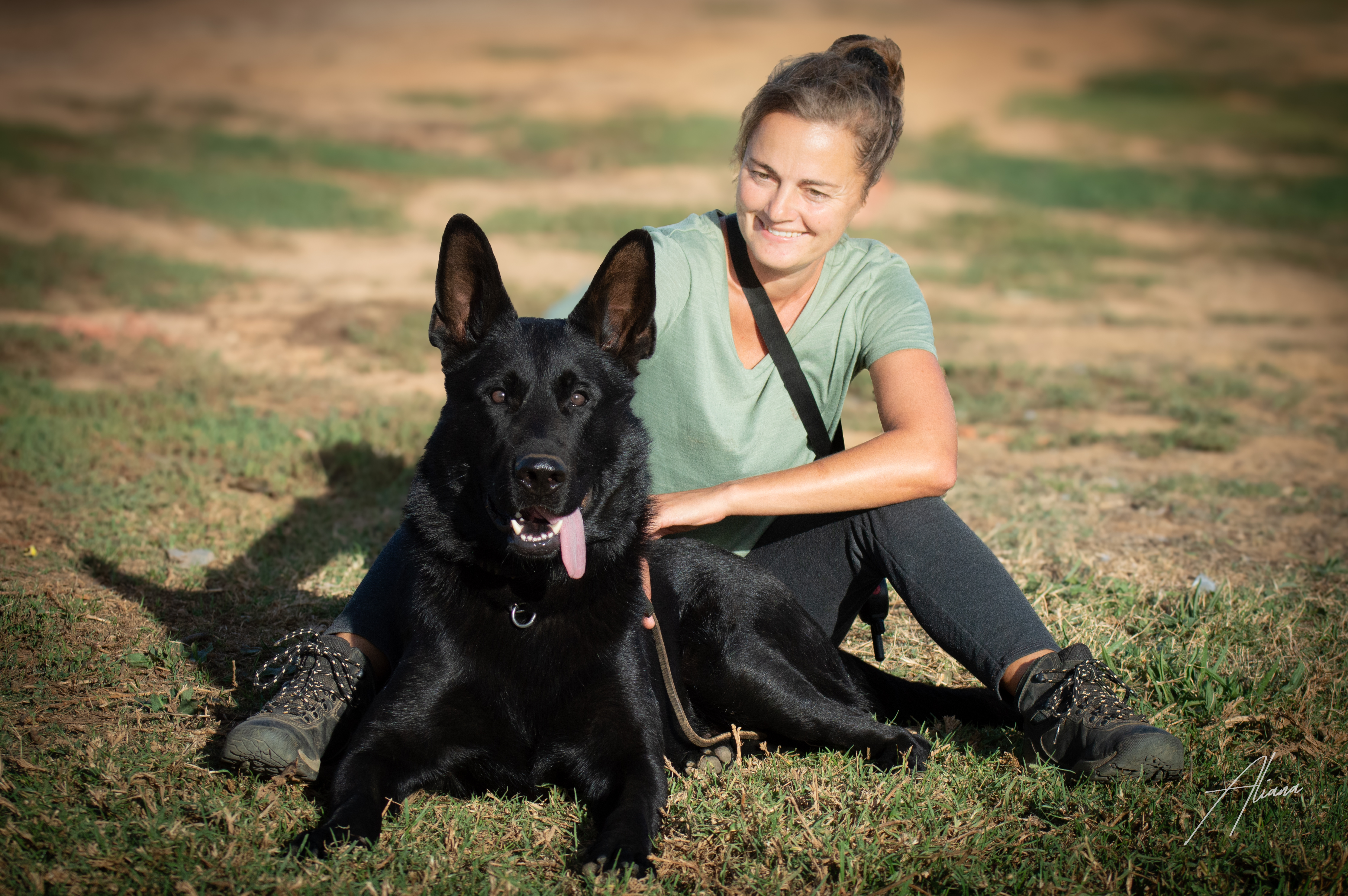 Aliana with her black German Shepherd